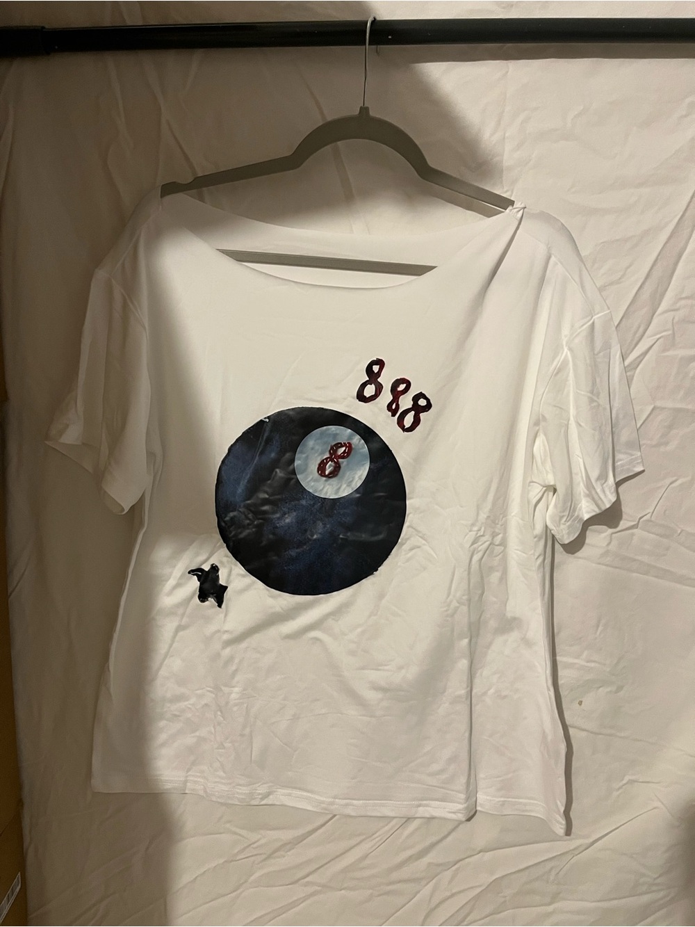 Woman’s white graphic tee